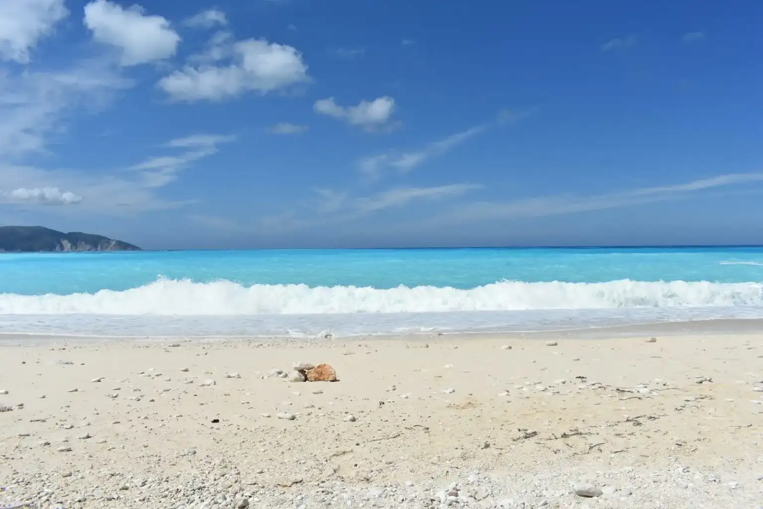A quiet Ionian beach seen from the water