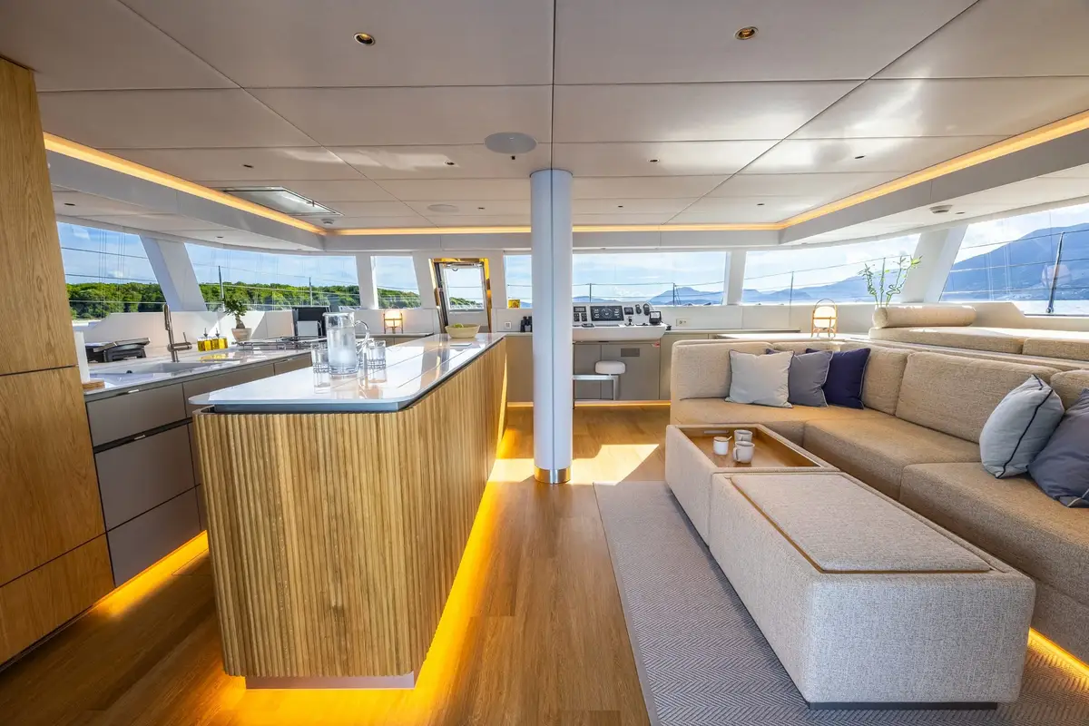 Bright saloon and lounge inside a Sunreef 60 crewed catamaran