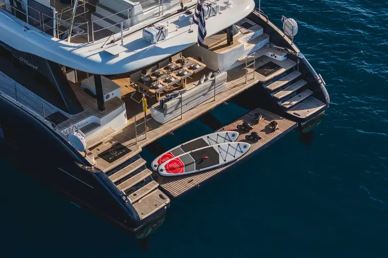 Stern steps and swim platform with a paddleboard