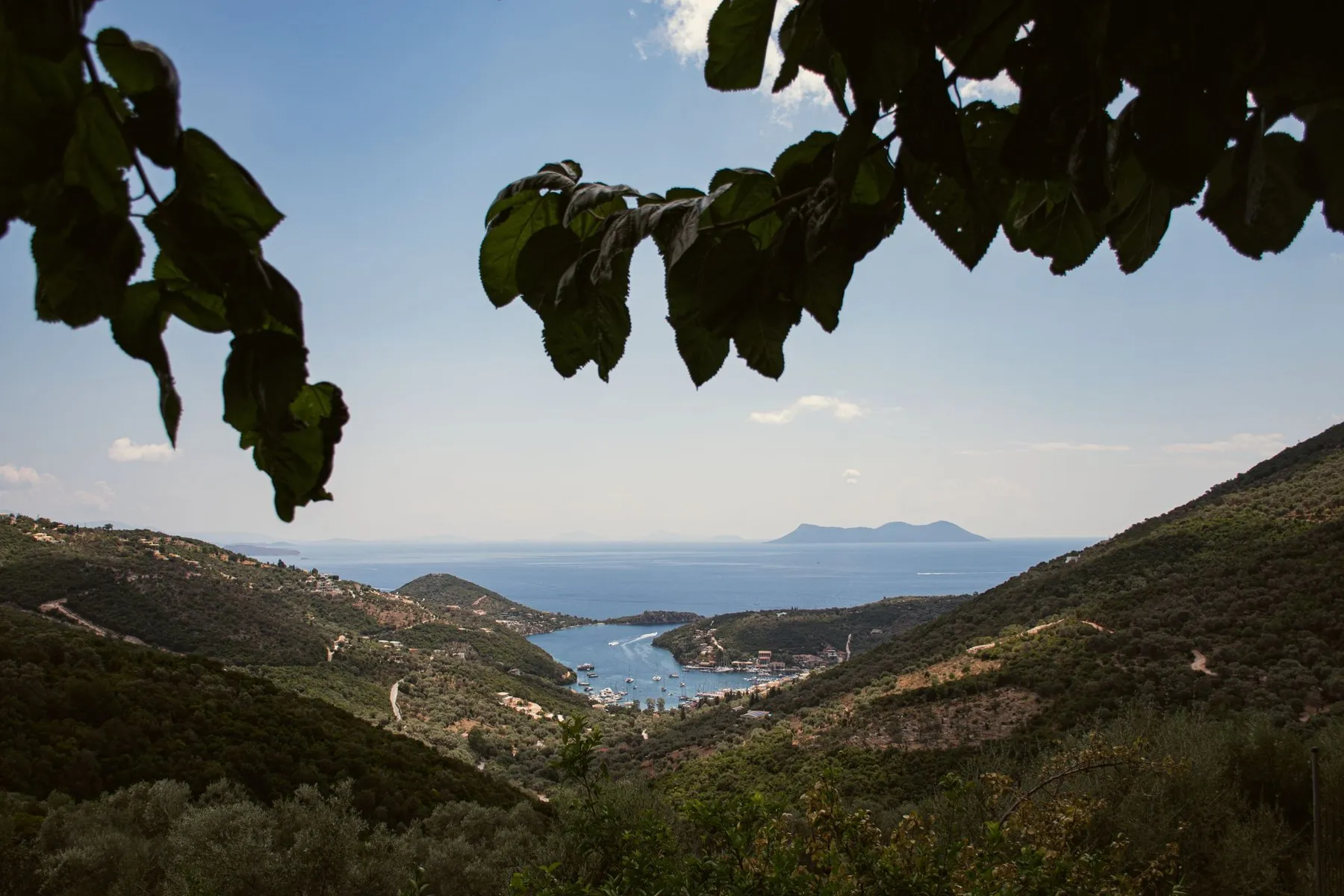 Sivota bay - Oasis Sailing Sivota bay from the hillside above — almost enclosed, with the entrance to open sea beyond